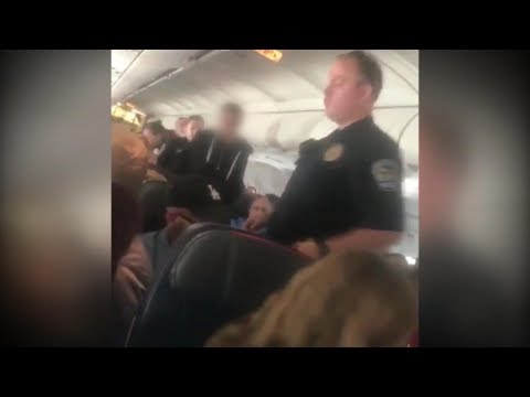 Passenger attempts to open cabin door mid-flight | ABC News